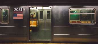 open door of subway train at platform
