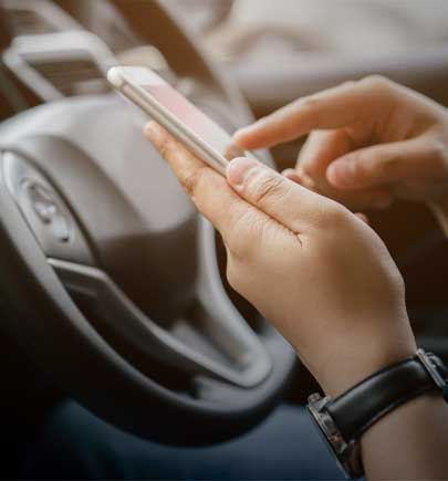 close up driver woman hand holding smartphone for using GPS navigation