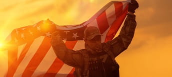 U.S Army person with national flag