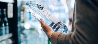 man holding water bottle